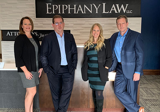 The partners at Epiphany Law, LLC bring diverse experience to meet their clients’ legal needs. Pictured left to right: Heather Macklin, Rob Macklin, Kathryn M. Blom and Kevin L. Eismann (Managing Partner).